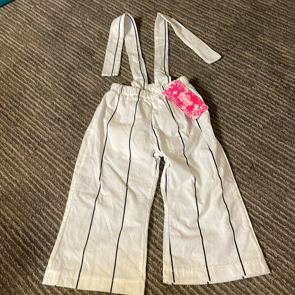 White pinstriped pants with tie